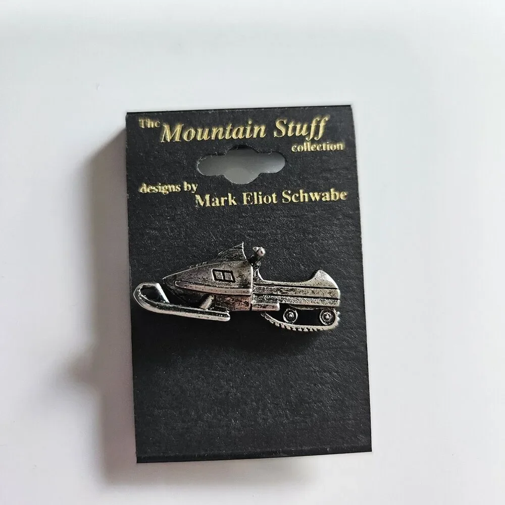 The Mountain Stuff Mark Eliot Schwabe Snowmobile Pin Silver Tone